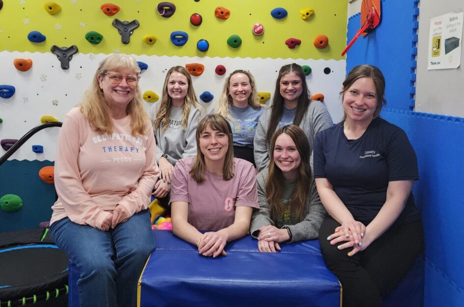 Staff posing together in the clinic